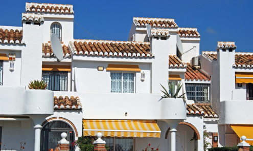 Should we build our houses using the same design and materials as Spanish homes?