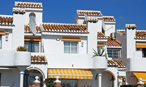 Should we build our houses using the same design and materials as Spanish homes?